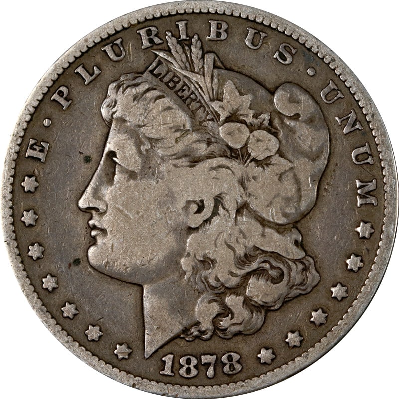 VAM 27 Long Nock 1878-S Silver Dollar United States Coin: VAM 27 Long Nock 1878-S Silver Dollar United States Coin This is a circulated 1878-S Morgan Silver Dollar featuring the VAM 27 Long Nock variety. It is composed of silver with a fineness of 0.9 and wa