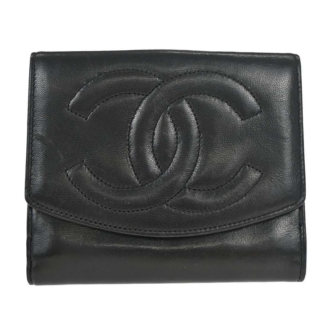 Vintage Chanel CC Black Lambskin Folding Wallet: Vintage Chanel CC Black Lambskin Folding Wallet Vintage Chanel folding wallet in black lambskin with the CC pattern. This compact wallet includes multiple interior storage sections and an exterior coi