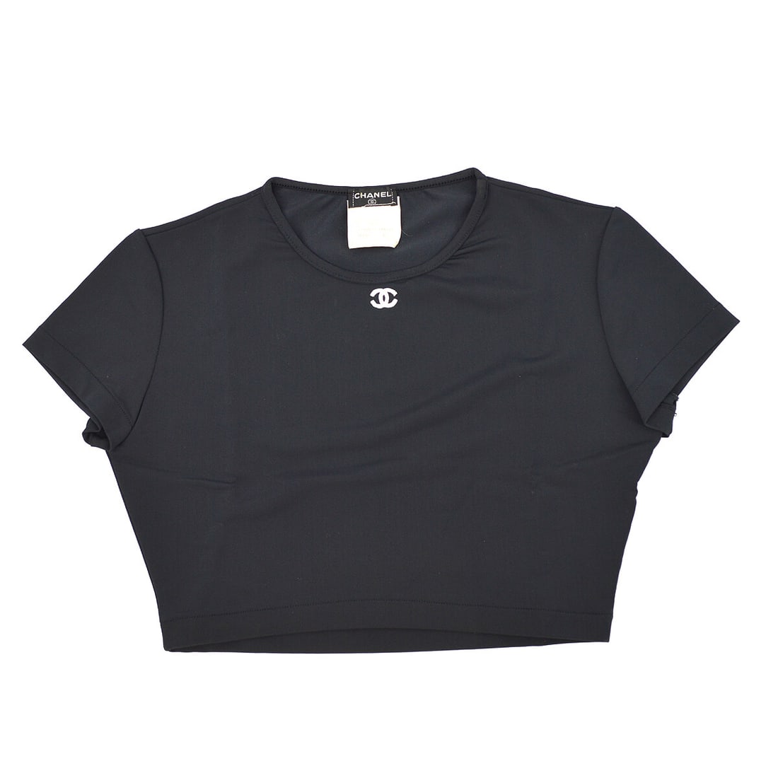 Chanel 95P Black Short Sleeve T Shirt Size 40: Chanel 95P Black Short Sleeve T Shirt Size 40 Black short sleeve top from Chanel with a round neckline and a basic, fitted silhouette. Made in France, this women's regular size 40 piece is crafted fro
