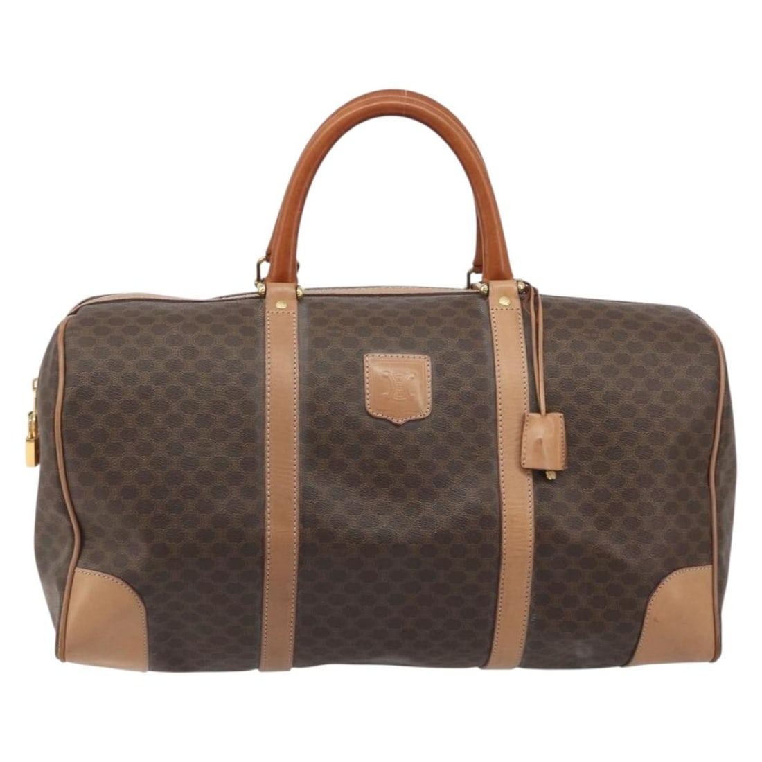 Celine Vintage Duffle Brown PVC Handbag Made in Italy: Celine Vintage Duffle Brown PVC Handbag Made in Italy Vintage Celine Duffle bag in brown PVC with Macadam coated canvas styling. This pre-owned piece shows overall wear consistent with use, including 