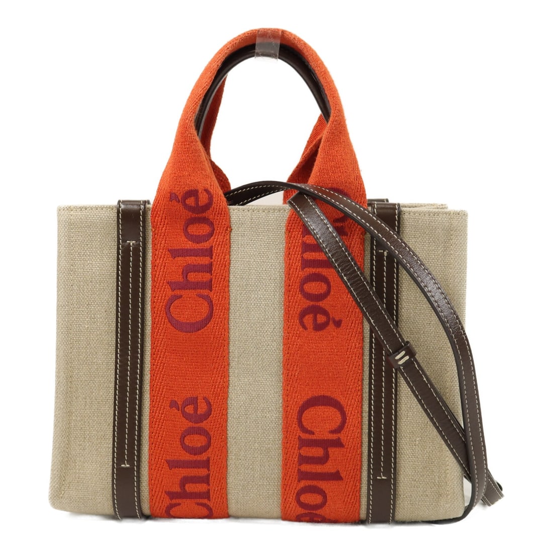 Chloe Woody Small Canvas 2way Shoulder Bag Orange SHW: Chloe Woody Small Canvas 2way Shoulder Bag Orange SHW Chloe Woody small 2-way shoulder bag in orange canvas with silver-tone hardware. This women's bag features a hand-carried or shoulder-carry design