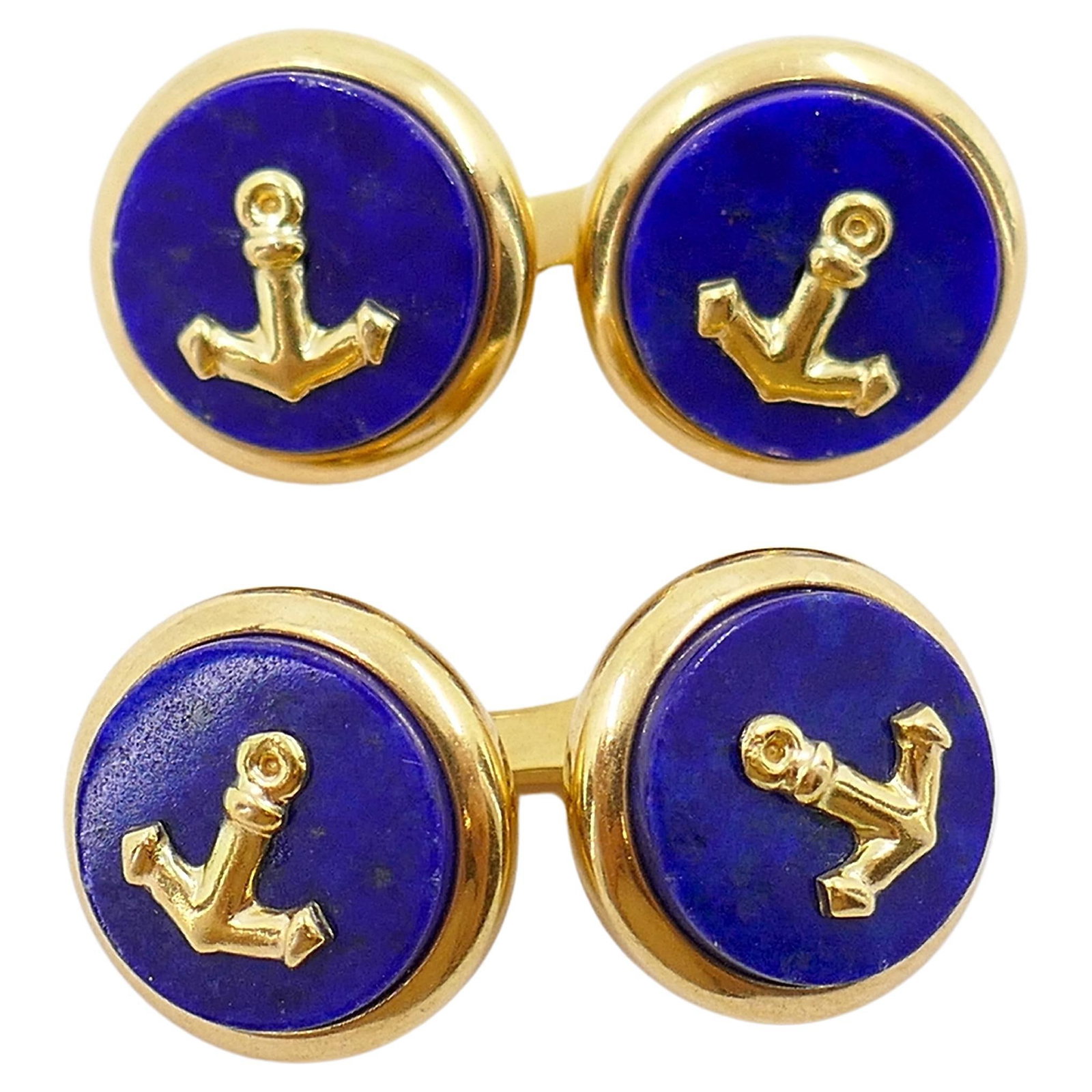Set of 2 Genio Brevetti 18k Gold Lapis Lazuli Anchor Cufflinks: Set of 2 Genio Brevetti 18k Gold Lapis Lazuli Anchor Cufflinks Vintage Genio & Brevetti cufflinks in 18k gold with lapis lazuli round-cut stones and a nautical anchor motif. Crafted in Europe during t