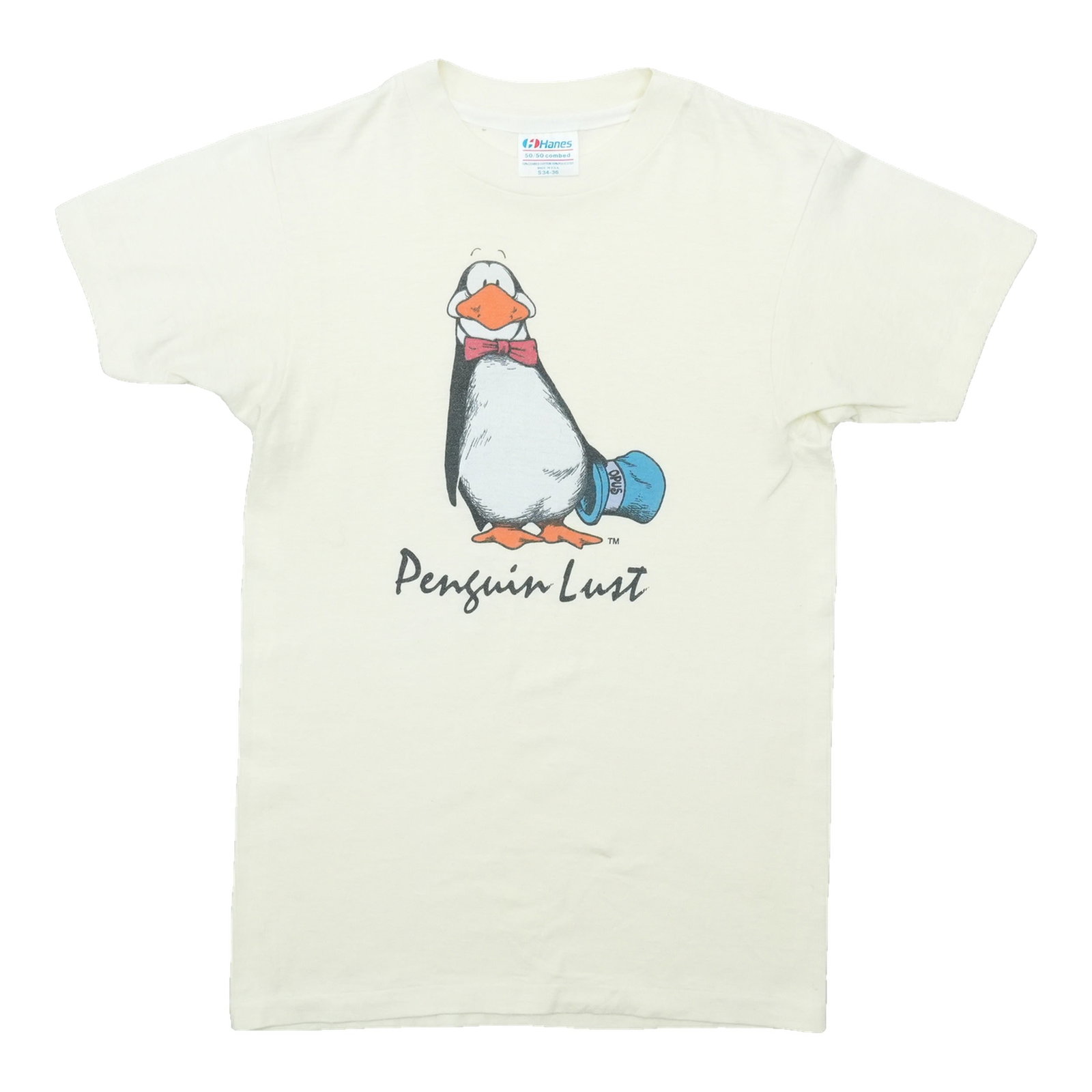 Vintage 1980s Penguin Lust T Shirt Small Cream Poly Cotton: Vintage 1980s Penguin Lust T Shirt Small Cream Poly Cotton Original vintage 1980s Penguin Lust shirt in excellent condition. This is a true vintage piece, not a modern reproduction. Sizes vary, so the