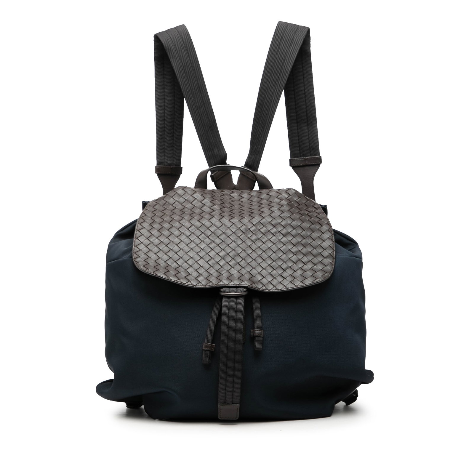 Bottega Veneta Intrecciato Flap Backpack in Canvas and Nappa: Bottega Veneta Intrecciato Flap Backpack in Canvas and Nappa Bottega Veneta flap backpack crafted with a canvas body and nappa leather intrecciato detailing. The design features a flat top handle, fla