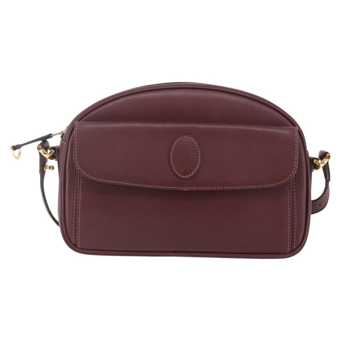 Cartier Must de Cartier burgundy leather shoulder bag: Cartier Must de Cartier burgundy leather shoulder bag This pre-owned Must de Cartier shoulder bag features a classic burgundy leather exterior and is designed for women. The bag shows signs of use, in