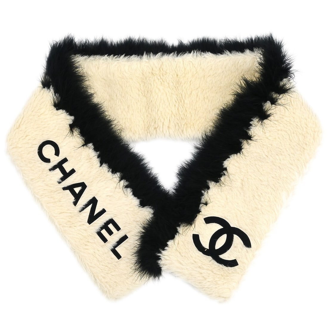 CHANEL White Black Fur Scarf Shawl Stole 55 in: CHANEL White Black Fur Scarf Shawl Stole 55 in Chanel fur shawl stole in white and black for women. This scarf-style accessory is presented in good to very good condition with black trim and no access