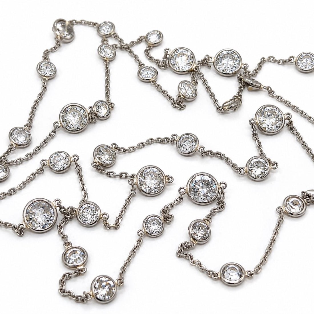 Diamond By The Yard Necklace in 14K White Gold and Platinum 16.50 Ct: Diamond By The Yard Necklace in 14K White Gold and Platinum 16.50 Ct Diamond by the yard necklace crafted in 14K white gold and platinum, set with 35 diamonds for a total approximate weight of 16.50 c