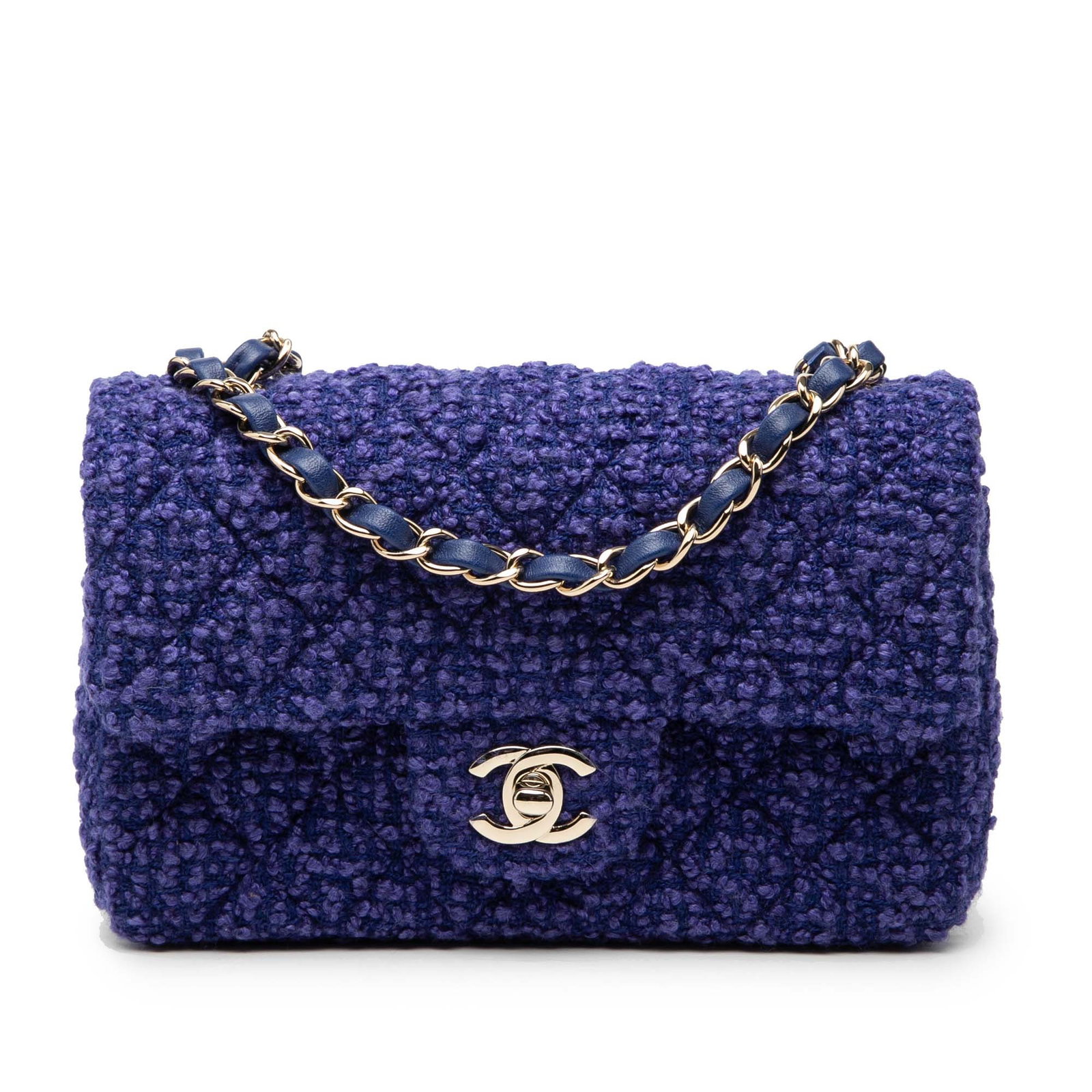 Chanel Mini Rectangular Tweed Crossbody Bag with Single Flap: Chanel Mini Rectangular Tweed Crossbody Bag with Single Flap This Chanel Mini Rectangular Classic Tweed Single Flap crossbody bag features a blue tweed exterior with a leather woven chain shoulder str