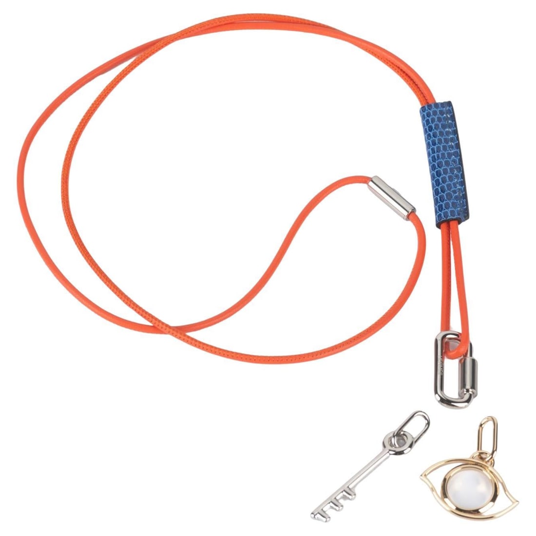 Hermes Curiosite Double Charm Necklace Palladium Blue Lizard: Hermes Curiosite Double Charm Necklace Palladium Blue Lizard Hermes Curiosite necklace with a double charm design featuring blue lizard accents. This versatile piece can be worn as a necklace or used 