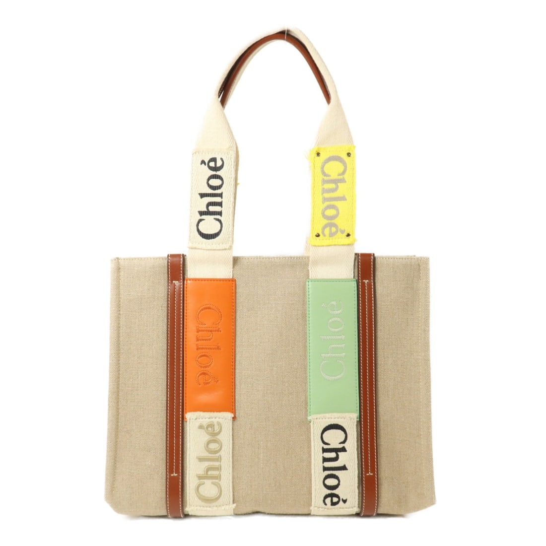 Chloe Woody Medium Canvas Tote Bag Beige Multicolor: Chloe Woody Medium Canvas Tote Bag Beige Multicolor Chloe Woody medium tote bag in beige and multicolor canvas. This women's tote features a structured everyday silhouette with an open interior pocket