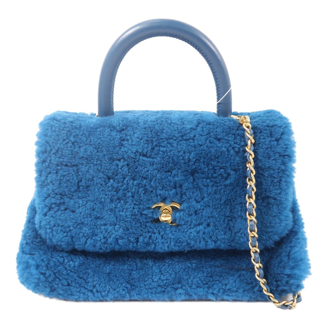 CHANEL Coco Handle Small 2 Way Shoulder Bag Blue Lambskin Shearling GHW: CHANEL Coco Handle Small 2 Way Shoulder Bag Blue Lambskin Shearling GHW CHANEL Coco Handle small 2-way shoulder bag in blue lambskin (sheep leather) and shearling. It features a turn lock closure, one
