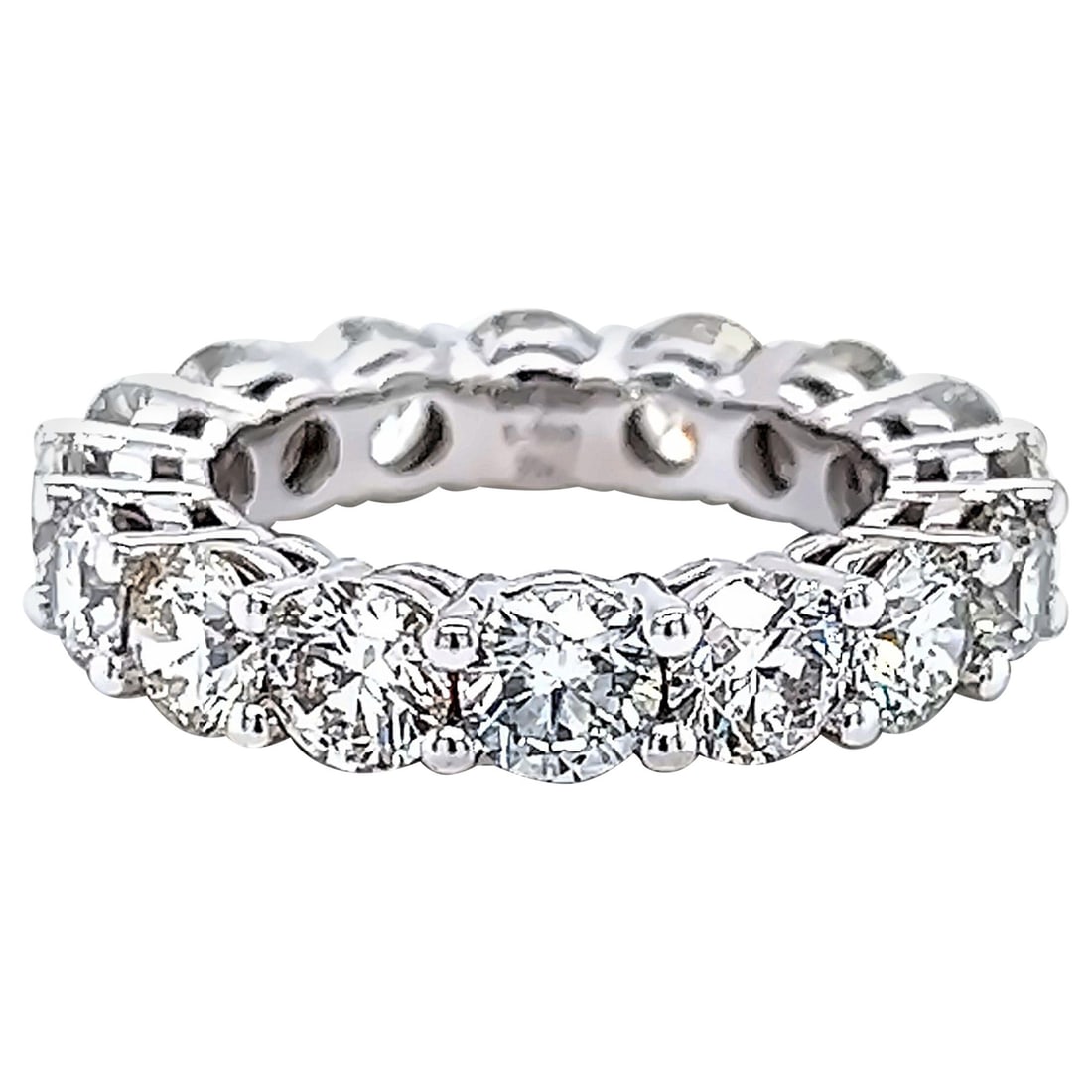 5.01ct Round Diamond Eternity Band 18k White Gold: 5.01ct Round Diamond Eternity Band 18k White Gold This stunning 5.01ct Round Diamond Eternity Band is expertly crafted in 18k white gold, showcasing a total of 16 round brilliant diamonds. Each diamon