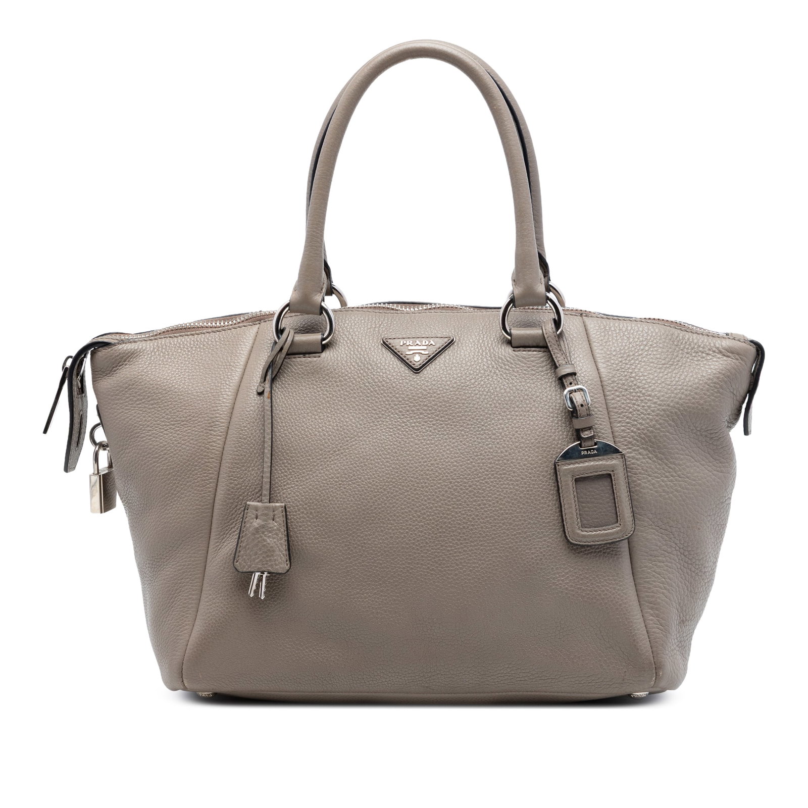 Prada Vitello Daino Leather Satchel with Double Handles: Prada Vitello Daino Leather Satchel with Double Handles Prada Vitello Daino Double Handle Bag in brown leather with rolled leather handles, a top zip closure, and interior zip pockets. Made in Italy. 