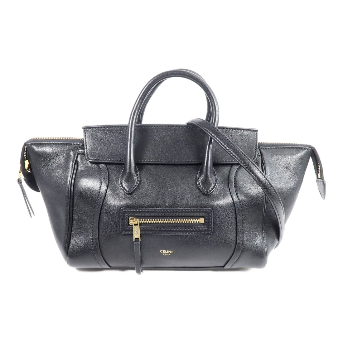 CELINE Small New Luggage 2way Shoulder Bag Black Calfskin: CELINE Small New Luggage 2way Shoulder Bag Black Calfskin Celine Small Luggage 2-way shoulder bag in black calfskin leather. This women's bag features a structured silhouette with top handles and a re