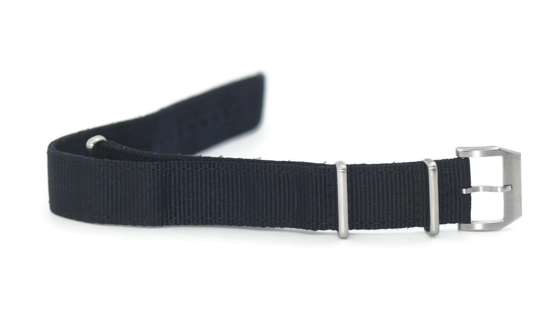 IWC 20mm Black Nylon Wristwatch Band: IWC 20mm Black Nylon Wristwatch Band Pre-owned IWC wristwatch band in black nylon. Made in Switzerland, this strap offers a straightforward replacement or accessory option for a compatible watch. Spec