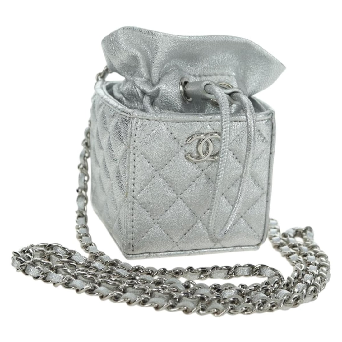 CHANEL CC Lamb Skin Shoulder Pouch Silver Gold Chain Strap: CHANEL CC Lamb Skin Shoulder Pouch Silver Gold Chain Strap Matelasse chain shoulder pouch in lamb skin with a silver and gold exterior. This women's shoulder bag is made in France and includes the dus