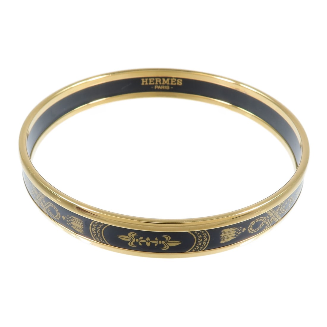 Hermes Grand Apparat enamel bangle bracelet black and gold: Hermes Grand Apparat enamel bangle bracelet black and gold Hermes Grand Apparat bangle bracelet in black enamel and metal with gold-tone detailing. This unisex bracelet is made in France and comes wit