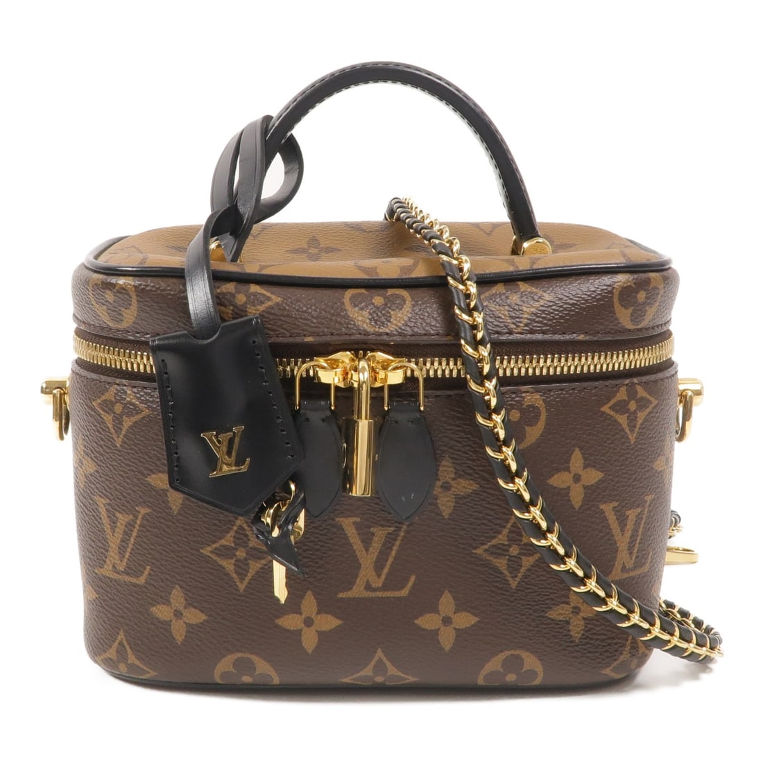 Louis Vuitton M47128 Vanity PM Monogram Reverse 2 Way Bag: Louis Vuitton M47128 Vanity PM Monogram Reverse 2 Way Bag Vanity PM 2-way shoulder bag in Monogram Reverse PVC coated canvas with a brown exterior. This women's bag features a top handle and a removab