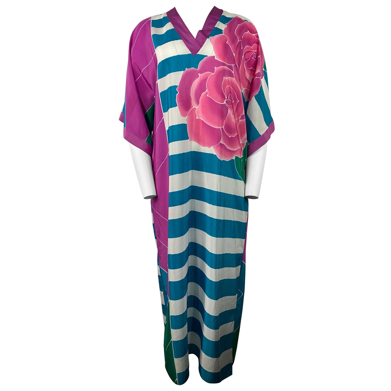 Oscar de la Renta striped floral silk maxi tunic dress: Oscar de la Renta striped floral silk maxi tunic dress An Oscar de la Renta silk tunica maxi dress featuring a purple, blue, white, and green striped and floral print. Designed with a floor-length sil