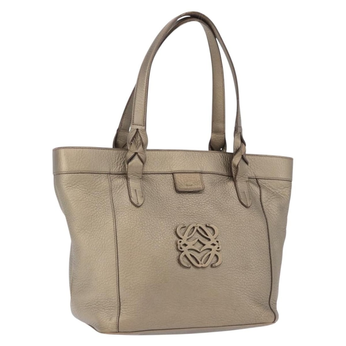 LOEWE Leather Tote Bag Gold Tone with Dust Bag: LOEWE Leather Tote Bag Gold Tone with Dust Bag Authentic LOEWE tote bag crafted in leather with a gold tone exterior. Made in Spain, this women's tote includes a dust bag and shows reasonable wear