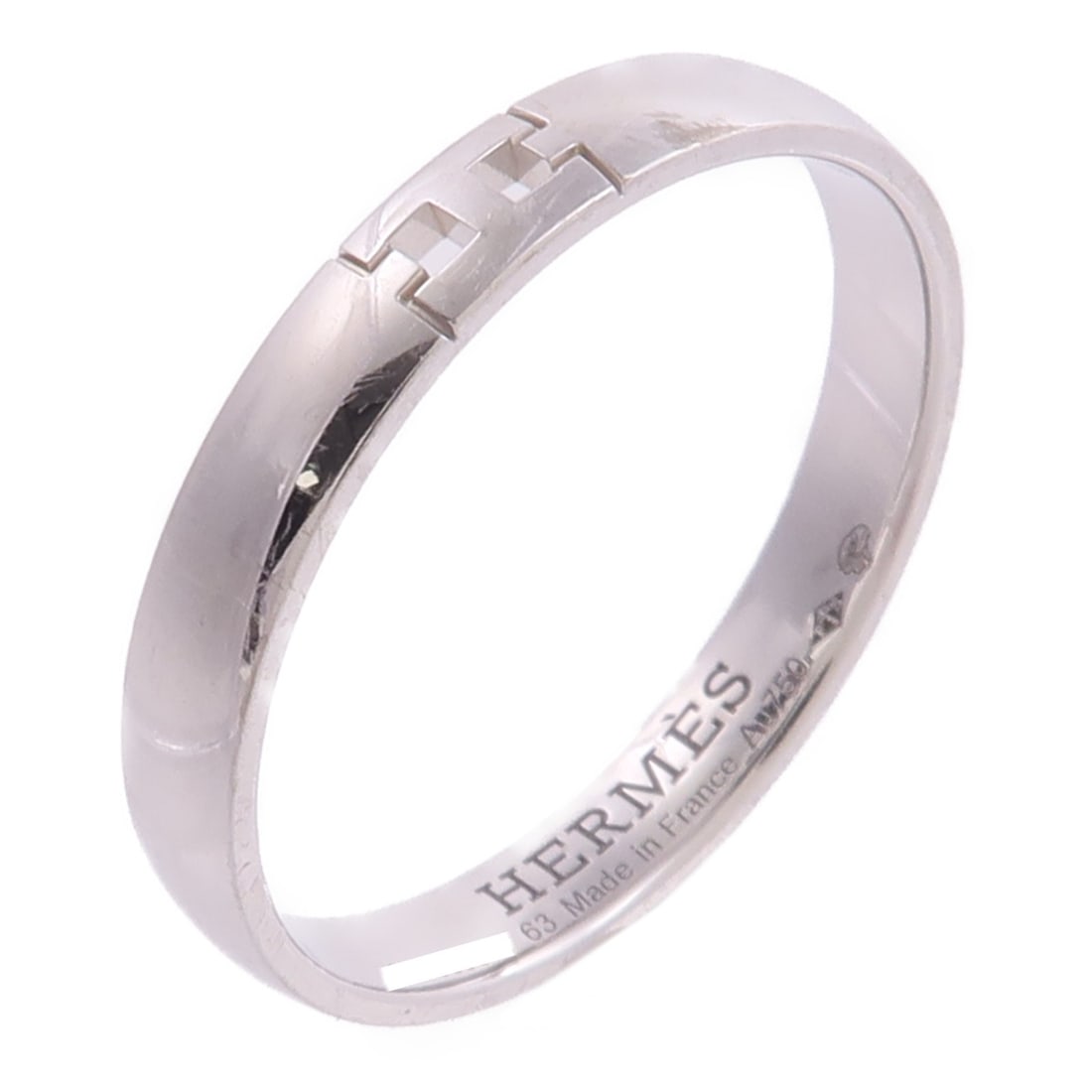 Hermes Ever Herakles 18K White Gold Ring Size 10.25: Hermes Ever Herakles 18K White Gold Ring Size 10.25 Hermes Ever Herakles ring crafted in 18K white gold with a silver-tone appearance. This women's ring has a clean, stone-free design and is made in F