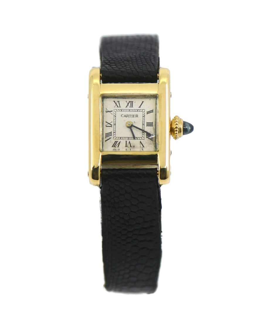 Cartier Tank Mini Women s Manual Wind Leather Strap Gold Watch: Cartier Tank Mini Women s Manual Wind Leather Strap Gold Watch This Cartier Tank Mini wristwatch features an 18K yellow gold case paired with a white analog dial. Designed for women, it is powered by 