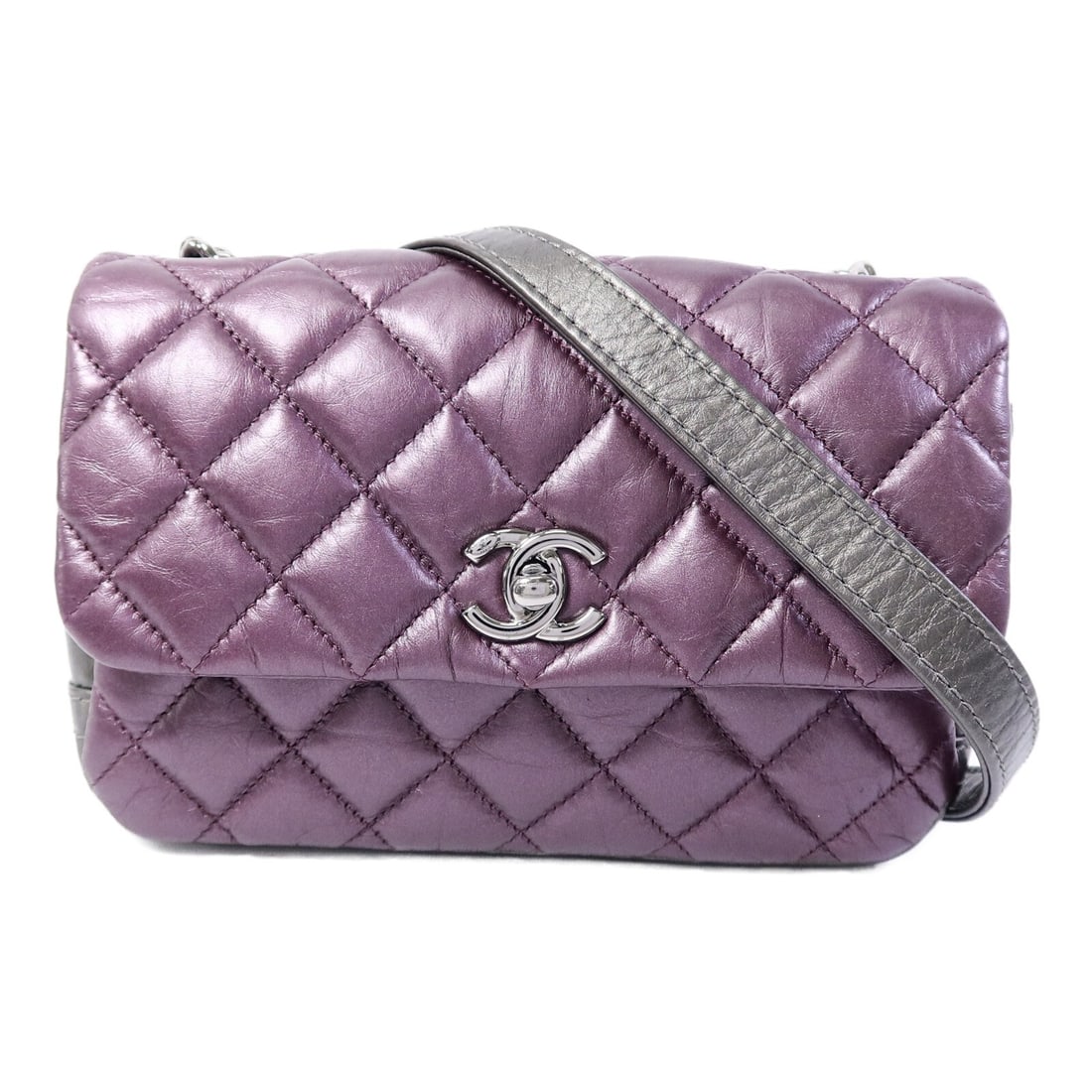 CHANEL CC 2 Way Purple Lambskin Shoulder Bag SHW: CHANEL CC 2 Way Purple Lambskin Shoulder Bag SHW CHANEL CC SHW 2-way shoulder bag crafted in purple lambskin leather. This women's shoulder bag features a turn-lock closure and includes a hologram sti