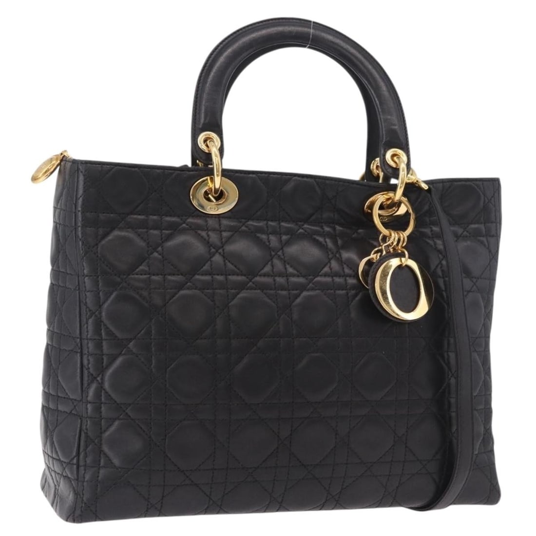 Christian Dior Lady Dior Black Leather Handbag: Christian Dior Lady Dior Black Leather Handbag This is a vintage Lady Dior bag crafted from black leather. The bag features a structured silhouette with handles and a shoulder strap, both exhibiting r