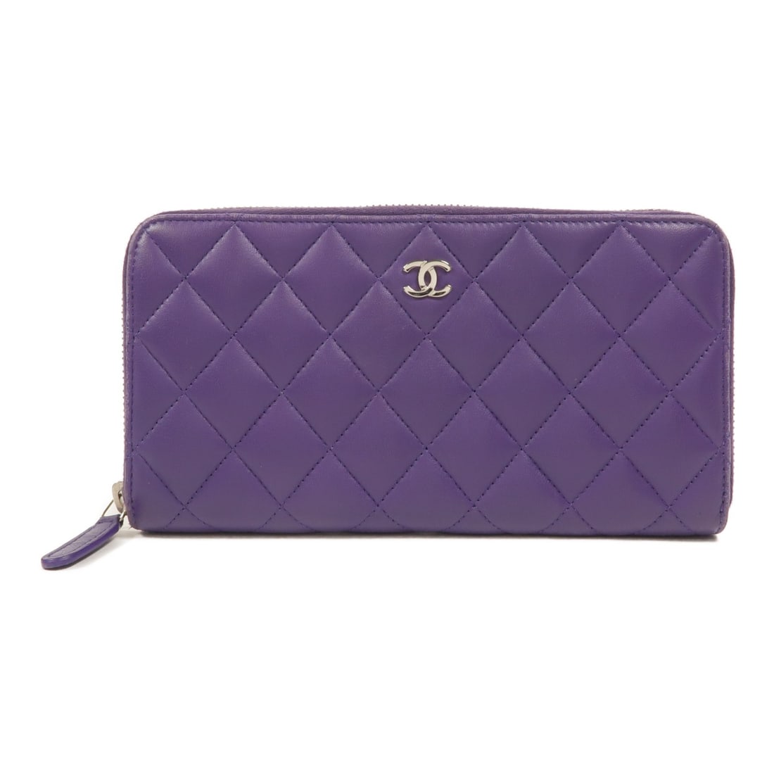 CHANEL A50097 Classic Zip Around Wallet Purple Lambskin CC SHW: CHANEL A50097 Classic Zip Around Wallet Purple Lambskin CC SHW A CHANEL classic long zipped long wallet in purple lambskin leather with CC silver-tone hardware. Designed in a long wallet style, it fea