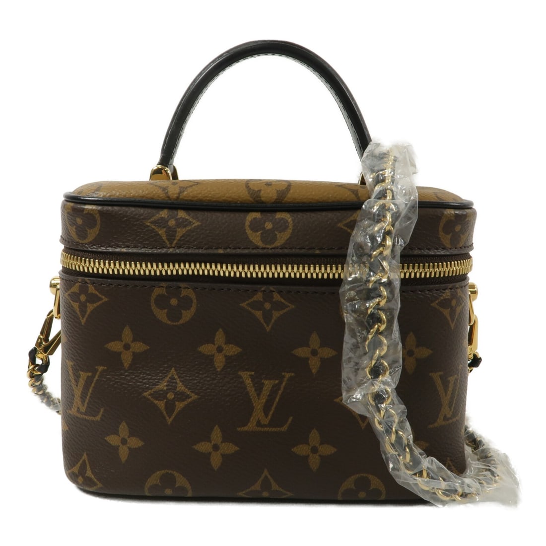 Louis Vuitton M45165 Vanity PM 2 Way Bag Monogram Reverse Brown: Louis Vuitton M45165 Vanity PM 2 Way Bag Monogram Reverse Brown Louis Vuitton Vanity PM 2-way shoulder bag in Monogram Reverse PVC coated canvas with a brown exterior. This women's bag features a stru