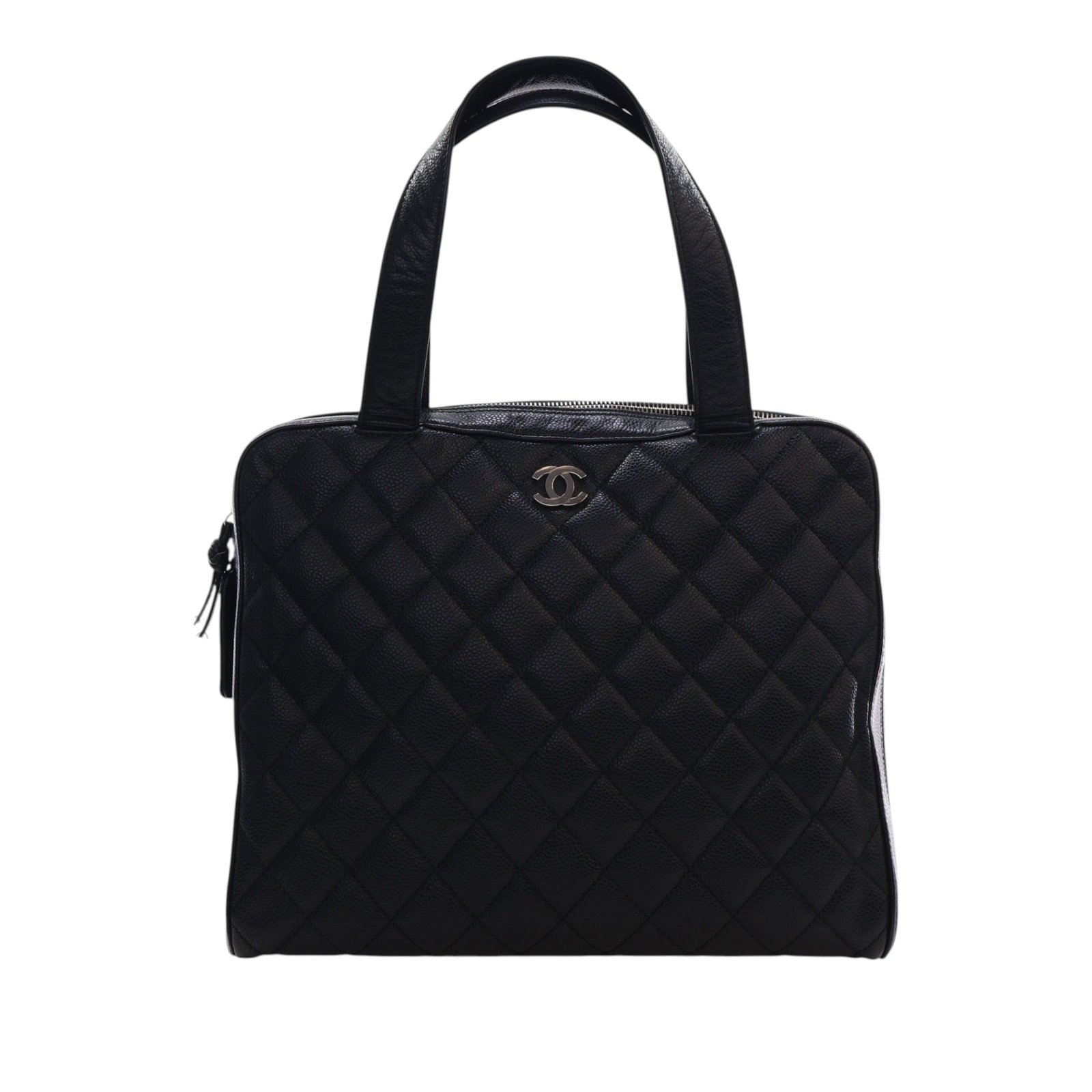 Chanel CC Bowler Handbag in Black Quilted Caviar Leather: Chanel CC Bowler Handbag in Black Quilted Caviar Leather Chanel CC Quilted Caviar Bowler Bag in black caviar leather with flat leather handles, a top zip closure, an exterior back slip pocket, and int