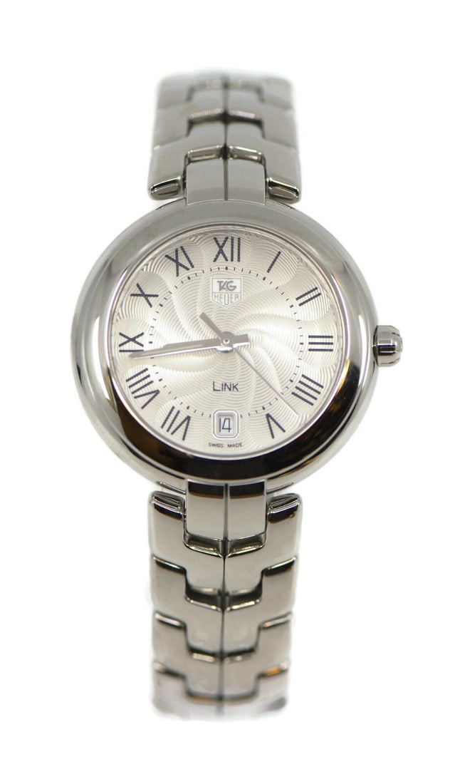 TAG Heuer Link WAT1314 Quartz Stainless Steel Watch with Box and Papers: TAG Heuer Link WAT1314 Quartz Stainless Steel Watch with Box and Papers This TAG Heuer Link wristwatch combines elegant design with precision craftsmanship. It features a quartz movement, housed in a 