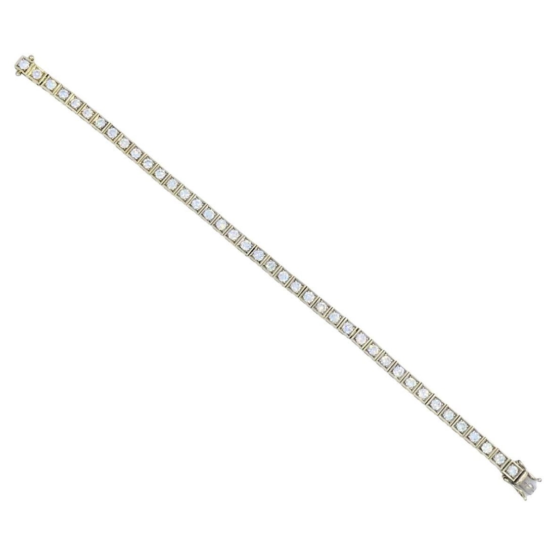 18k White Gold Diamond Tennis Bracelet 7 In Art Deco Style: 18k White Gold Diamond Tennis Bracelet 7 In Art Deco Style Elegant Art Deco tennis bracelet in 18k gold featuring a continuous row of 40 square-cut diamonds set in a channel setting. The bracelet has 