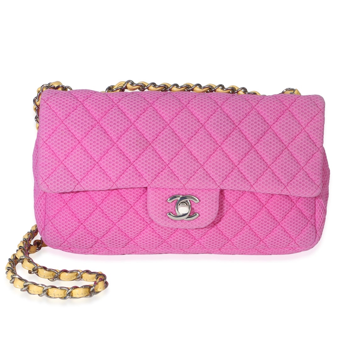 Chanel Perforated Jersey Medium Flap Shoulder Bag Pink: Chanel Perforated Jersey Medium Flap Shoulder Bag Pink Pre-owned Chanel medium flap bag in pink perforated jersey with a turnlock closure and silver-tone hardware. This shoulder bag features a yellow 
