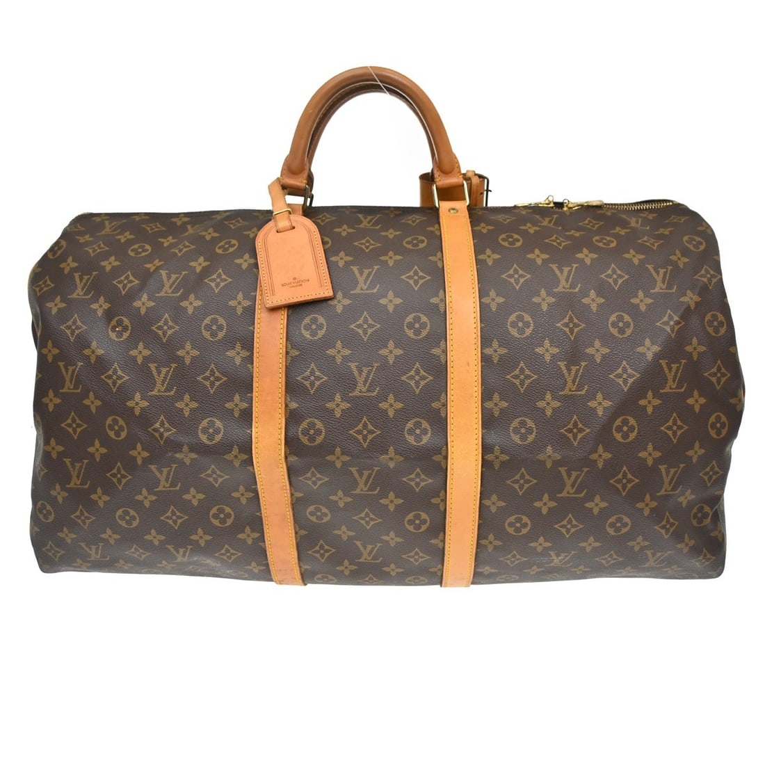 Louis Vuitton Keepall unisex brown canvas travel bag: Louis Vuitton Keepall unisex brown canvas travel bag Louis Vuitton Keepall Monogram travel bag in brown canvas with leather trim. This unisex piece is presented in good condition, showing light scuffi