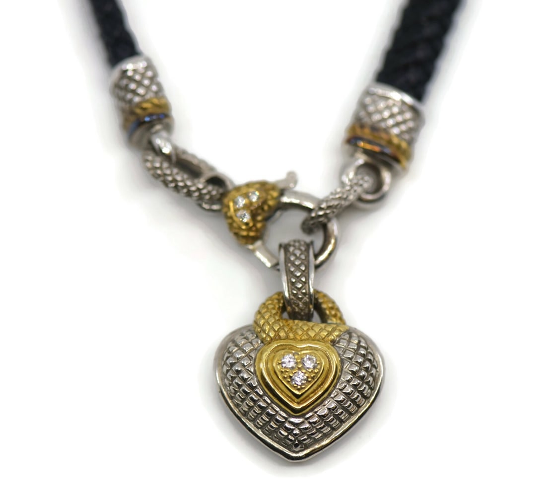 Judith Ripka 18K Gold Sterling Silver Diamond Pendant Necklace: Judith Ripka 18K Gold Sterling Silver Diamond Pendant Necklace This exquisite necklace by Judith Ripka features a stunning pendant crafted from a combination of 18K gold and sterling silver. The neckl