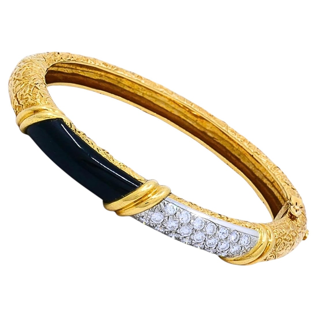 Van Cleef Arpels 18k Gold Platinum Bangle with Onyx and Diamonds: Van Cleef Arpels 18k Gold Platinum Bangle with Onyx and Diamonds Vintage Van Cleef & Arpels bangle bracelet crafted in textured 18k gold with platinum accents, featuring an onyx panel and pave-set dia