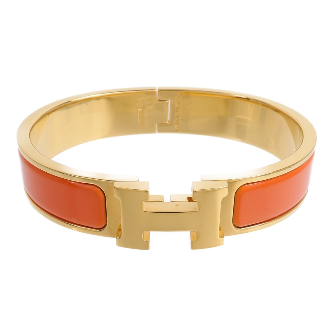 Hermes Clic-H Bracelet Orange Metal Gold Tone: Hermes Clic-H Bracelet Orange Metal Gold Tone Hermes Clic-H bracelet in orange metal with gold-tone hardware. Includes storage box and storage bags. Condition is AB: Very Good. Specifications Brand: H