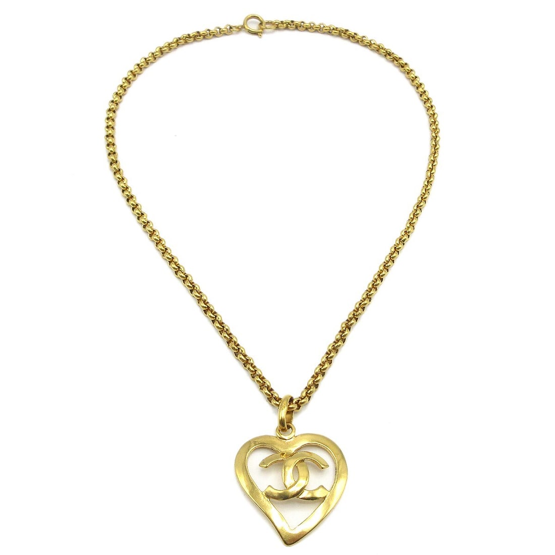 Vintage Chanel 95P Gold Plated Heart Charm Necklace: Vintage Chanel 95P Gold Plated Heart Charm Necklace Vintage Chanel pendant necklace with a heart-shaped charm and CC logo design. This gold-plated necklace is made in France and presents in very good 