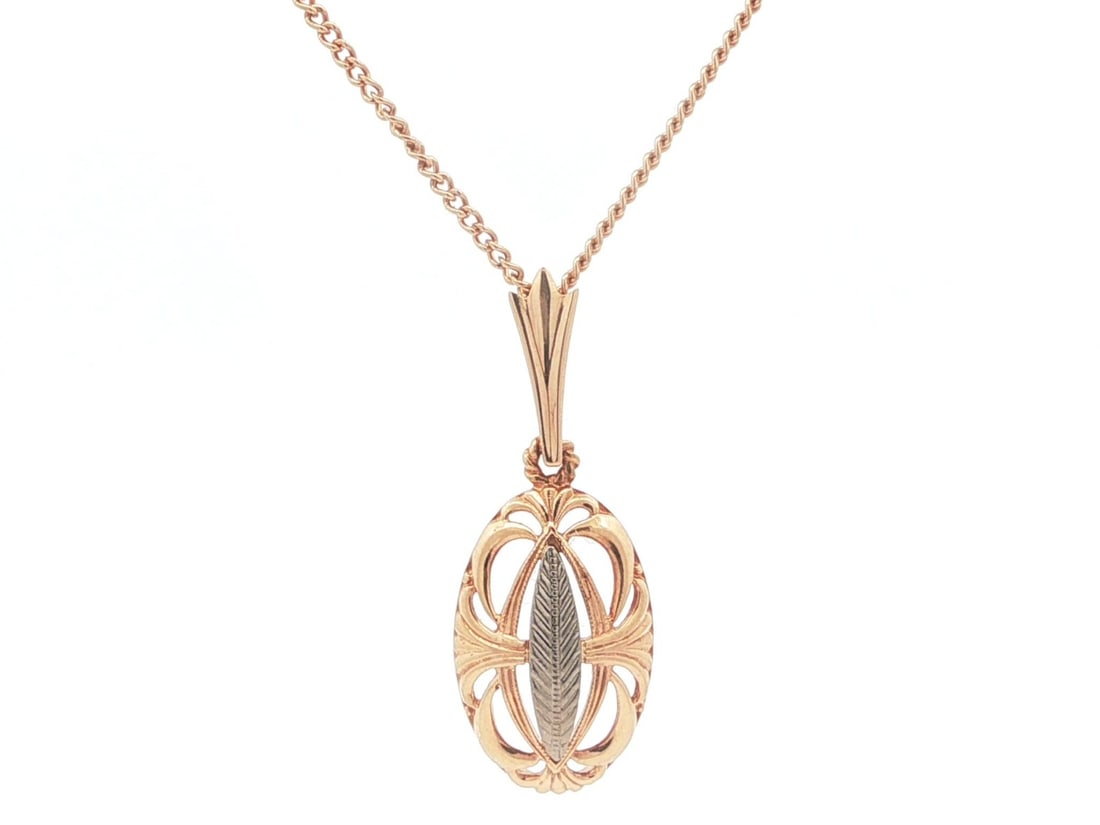 Retro 13-14k Rose and White Gold Hand Engraved Shield Pendant Necklace: Retro 13-14k Rose and White Gold Hand Engraved Shield Pendant Necklace This vintage retro pendant features an open work medieval shield design, expertly hand engraved and crafted from 13-14k rose and 