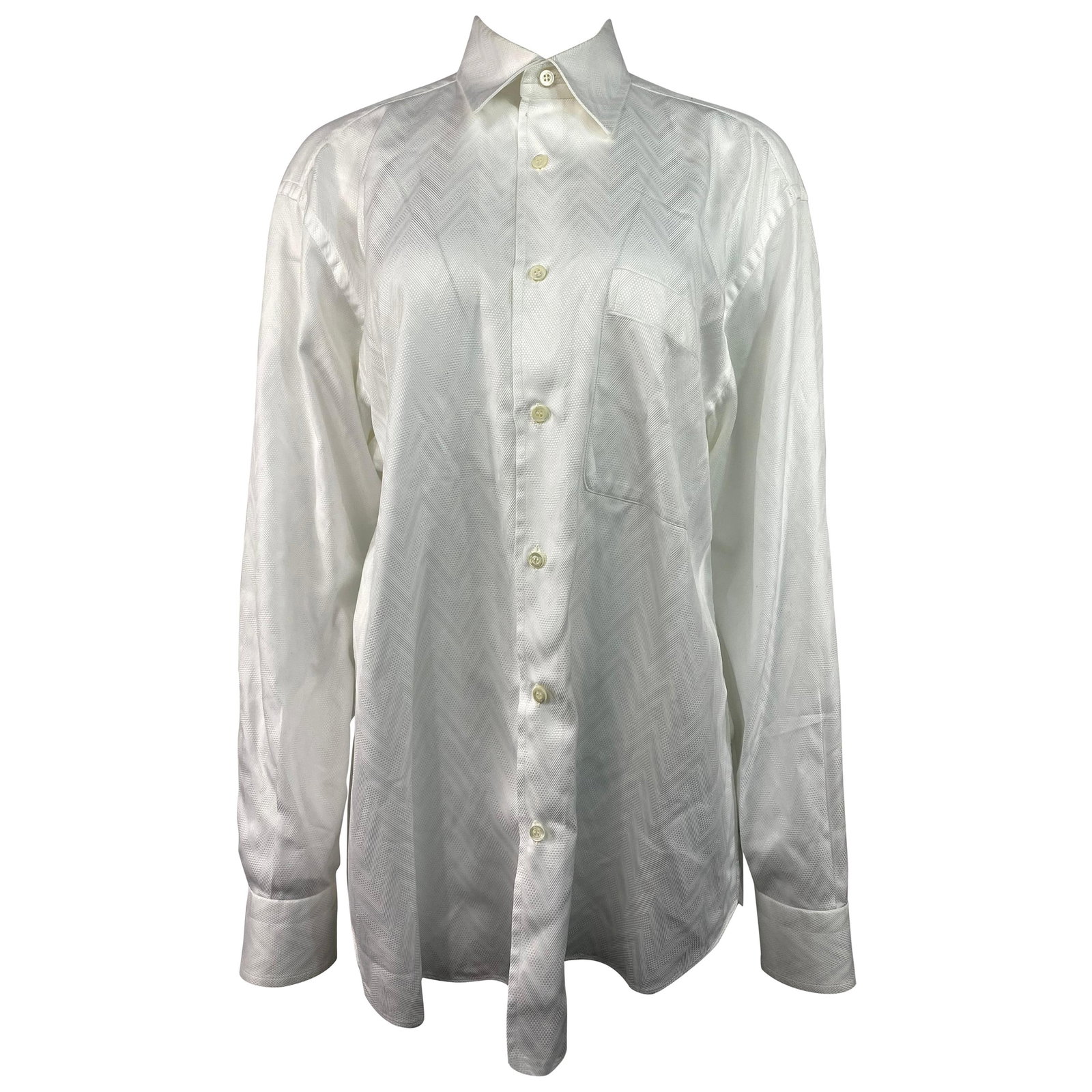 White Cotton Dress Shirt Brioni for Neiman Marcus Made in Italy: White Cotton Dress Shirt Brioni for Neiman Marcus Made in Italy White cotton button-down shirt with a dotted and striped zigzag geometric pattern, front left pocket, and collar detail. It has a formal