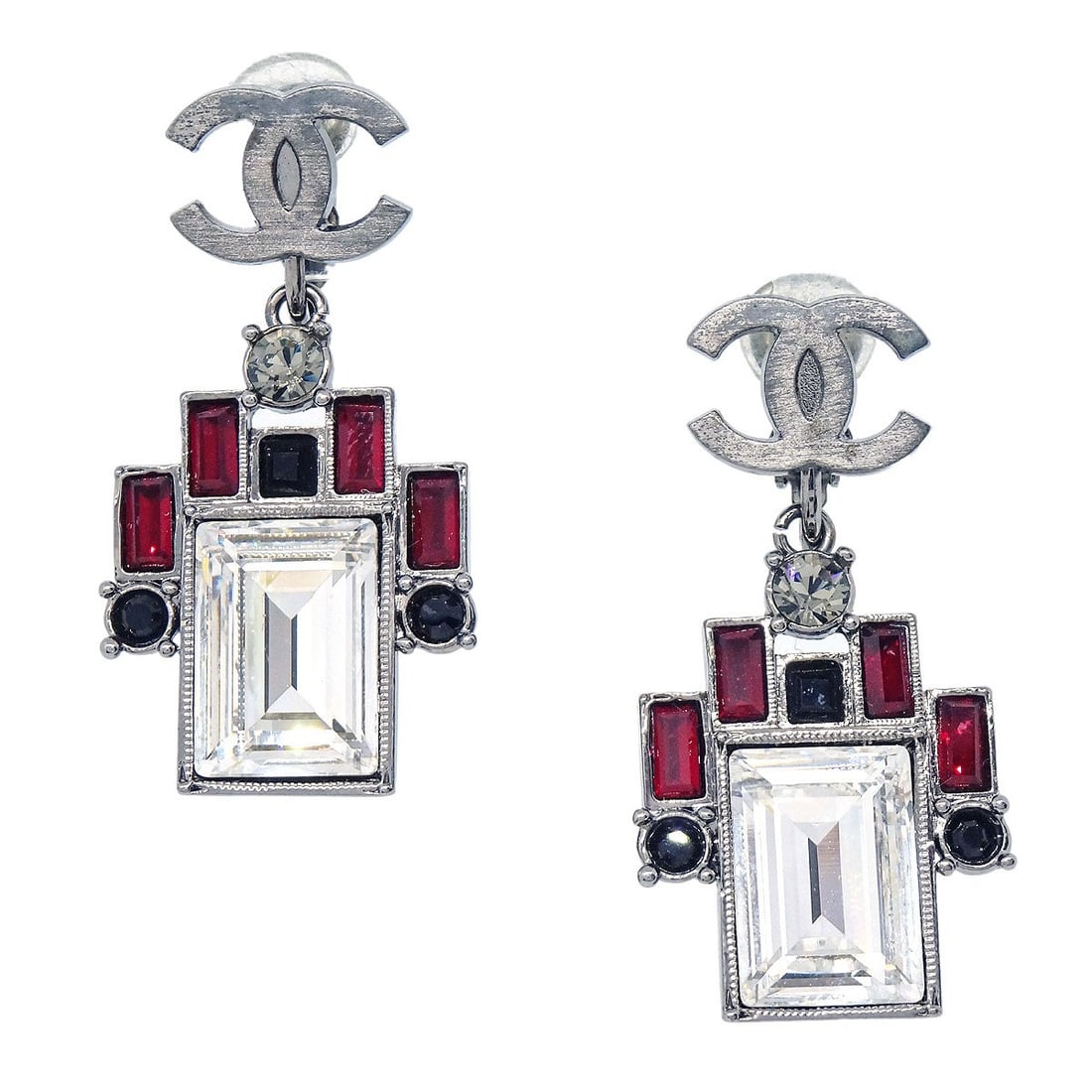 Chanel 05P CC Dangle Clip-On Earrings Silver Plated Rhinestone: Chanel 05P CC Dangle Clip-On Earrings Silver Plated Rhinestone Chanel CC clip-on dangle earrings in silver plated metal with rhinestone accents. This 05P pair features a button-style design and comes 