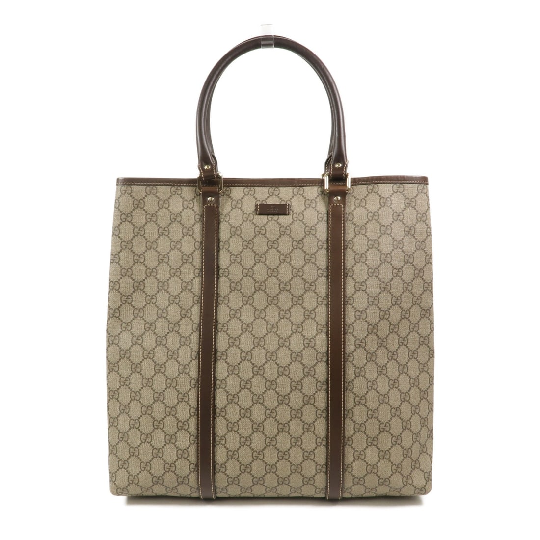 Gucci 223668 GG Tote in Brown PVC Coated Canvas: Gucci 223668 GG Tote in Brown PVC Coated Canvas A Gucci GG SHW tote bag in brown PVC coated canvas. It features one inside zip pocket and one open inside pocket, and comes with storage bags. The item 
