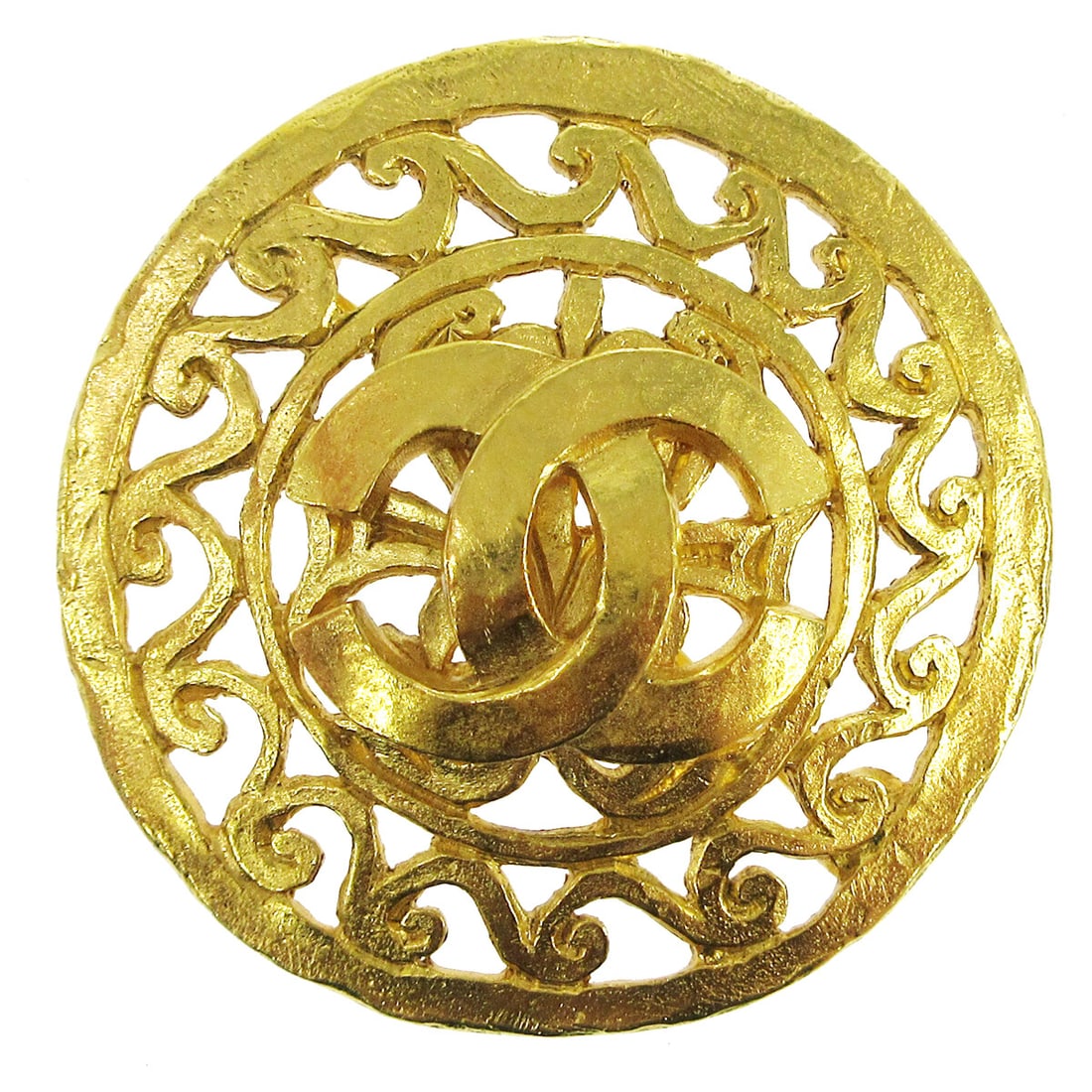 Chanel 95A Gold Tone Medallion CC Logo Brooch: Chanel 95A Gold Tone Medallion CC Logo Brooch Gold-tone Chanel medallion brooch pin featuring the CC logo and a decorative filigree design. Marked 95A and made in France. Condition is very good with a