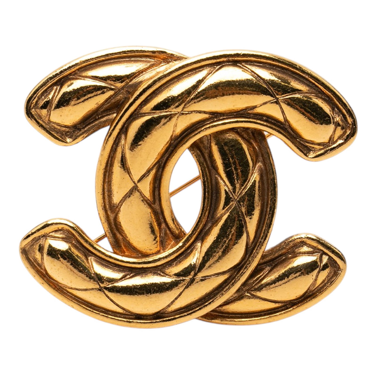 Chanel CC Quilted Gold Plated Metal Brooch: Chanel CC Quilted Gold Plated Metal Brooch Gold plated quilted brooch with a CC motif and back pin closure. It is made of metal and presented in a gold color. Origin: France. Condition: AB, with scrat