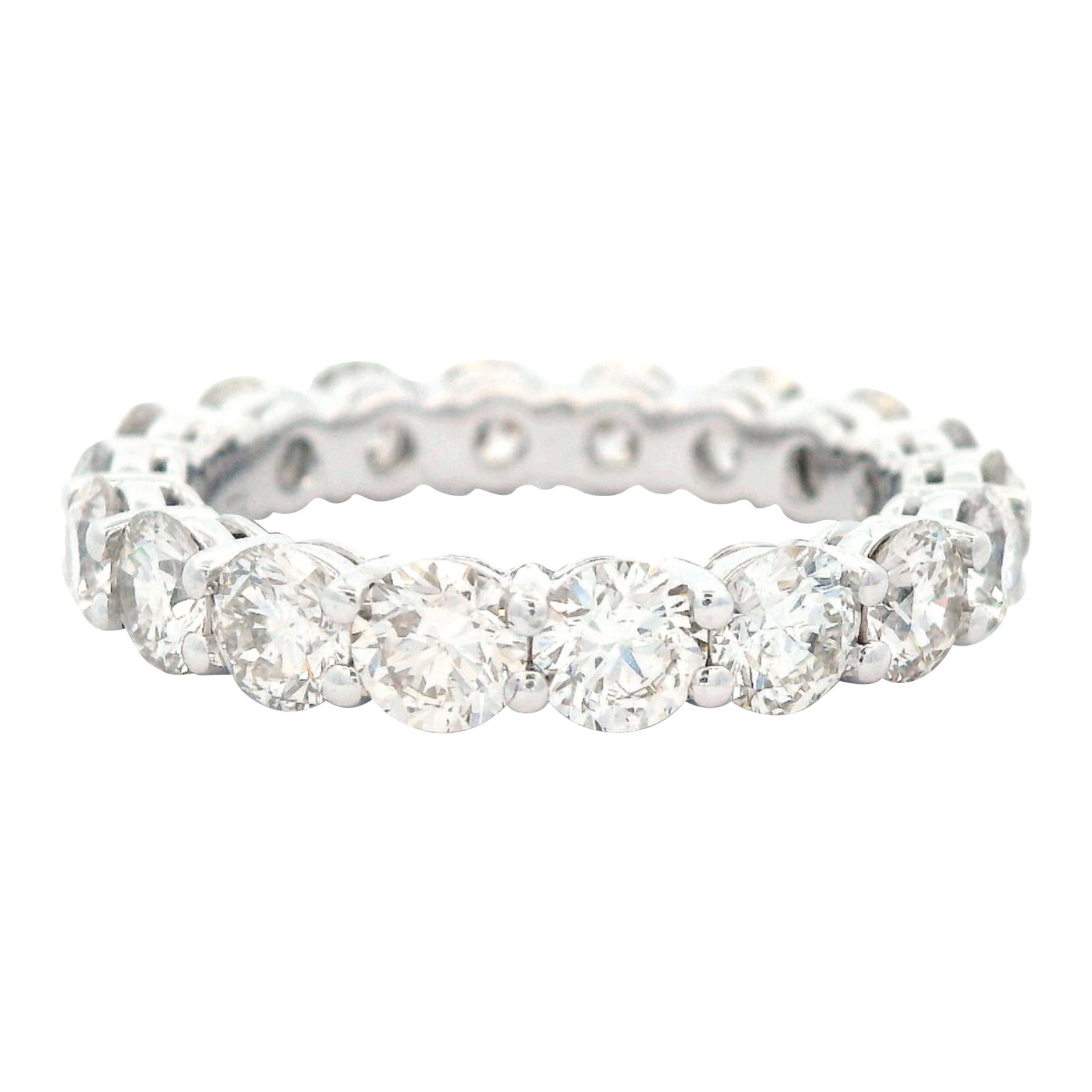 3.52ct Diamond Eternity Band 18k White Gold: 3.52ct Diamond Eternity Band 18k White Gold This stunning round eternity band features 18 round brilliant diamonds totaling 3.52 carats, showcasing approximately G color and VS clarity. Crafted from 1
