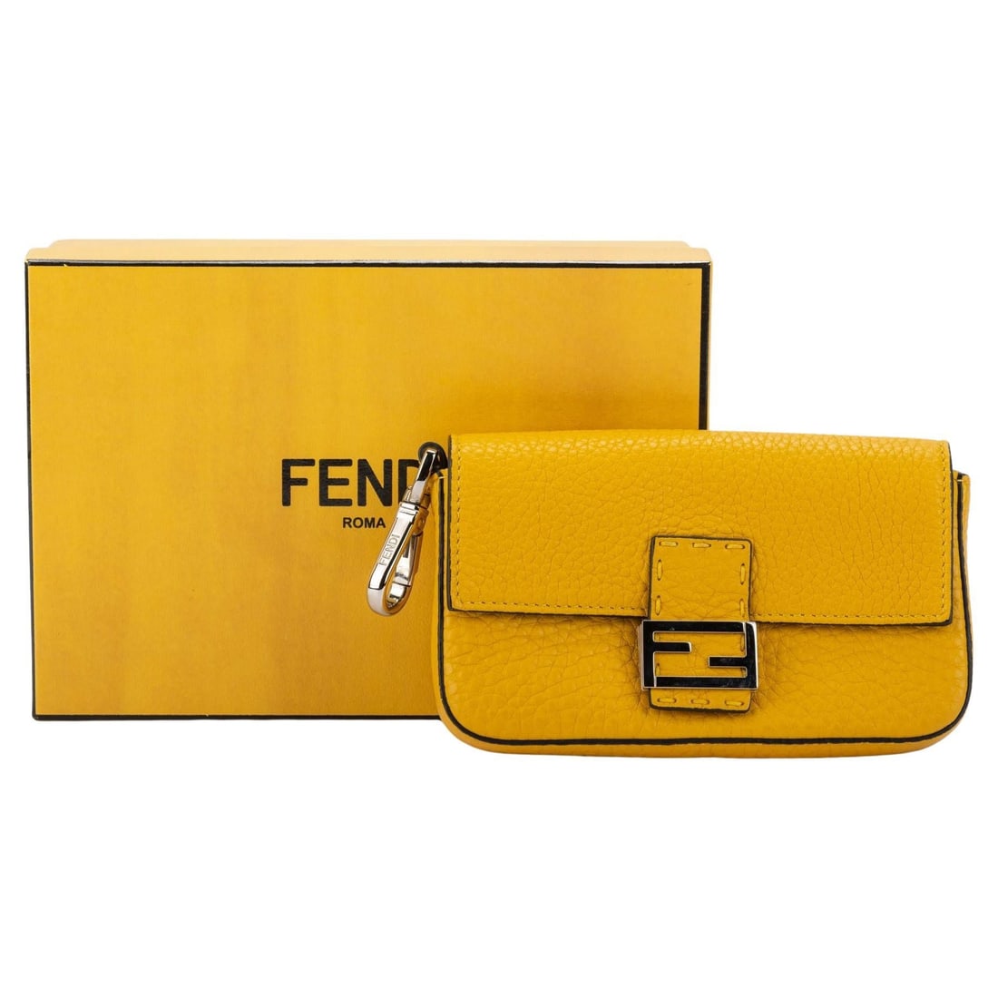 Fendi Yellow Micro Baguette New with Box and Dustcover: Fendi Yellow Micro Baguette New with Box and Dustcover Introducing the exquisite Fendi Yellow Micro Baguette, a stunning addition to any fashion collection. This designer handbag features a vibrant ye