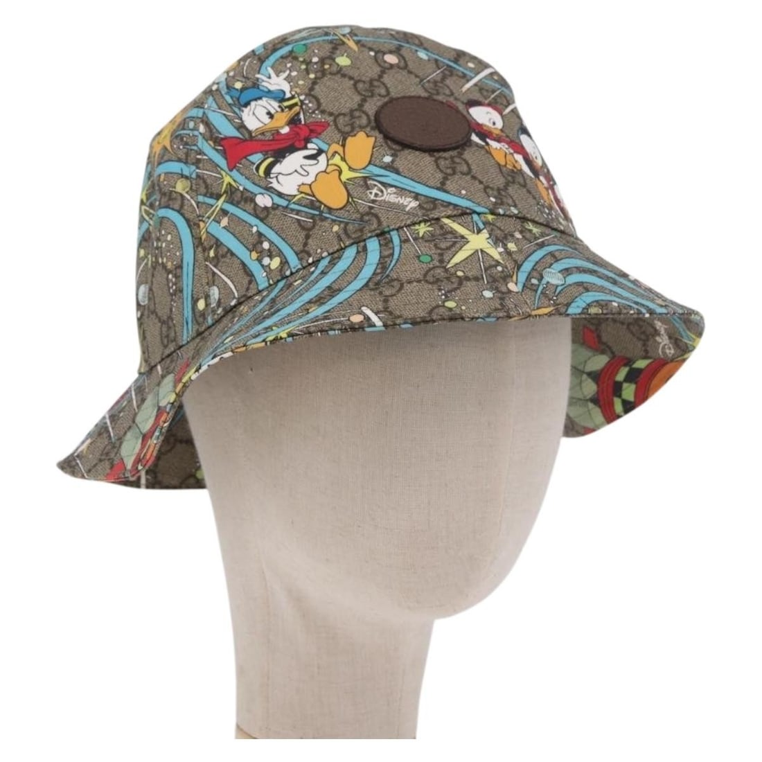 Gucci Disney Donald Duck GG Supreme Beige PVC Leather Hat M: Gucci Disney Donald Duck GG Supreme Beige PVC Leather Hat M Gucci GG Supreme Disney Donald Duck hat in beige PVC leather and GG canvas. This women's hat is made in Italy and includes a dust bag. Condi
