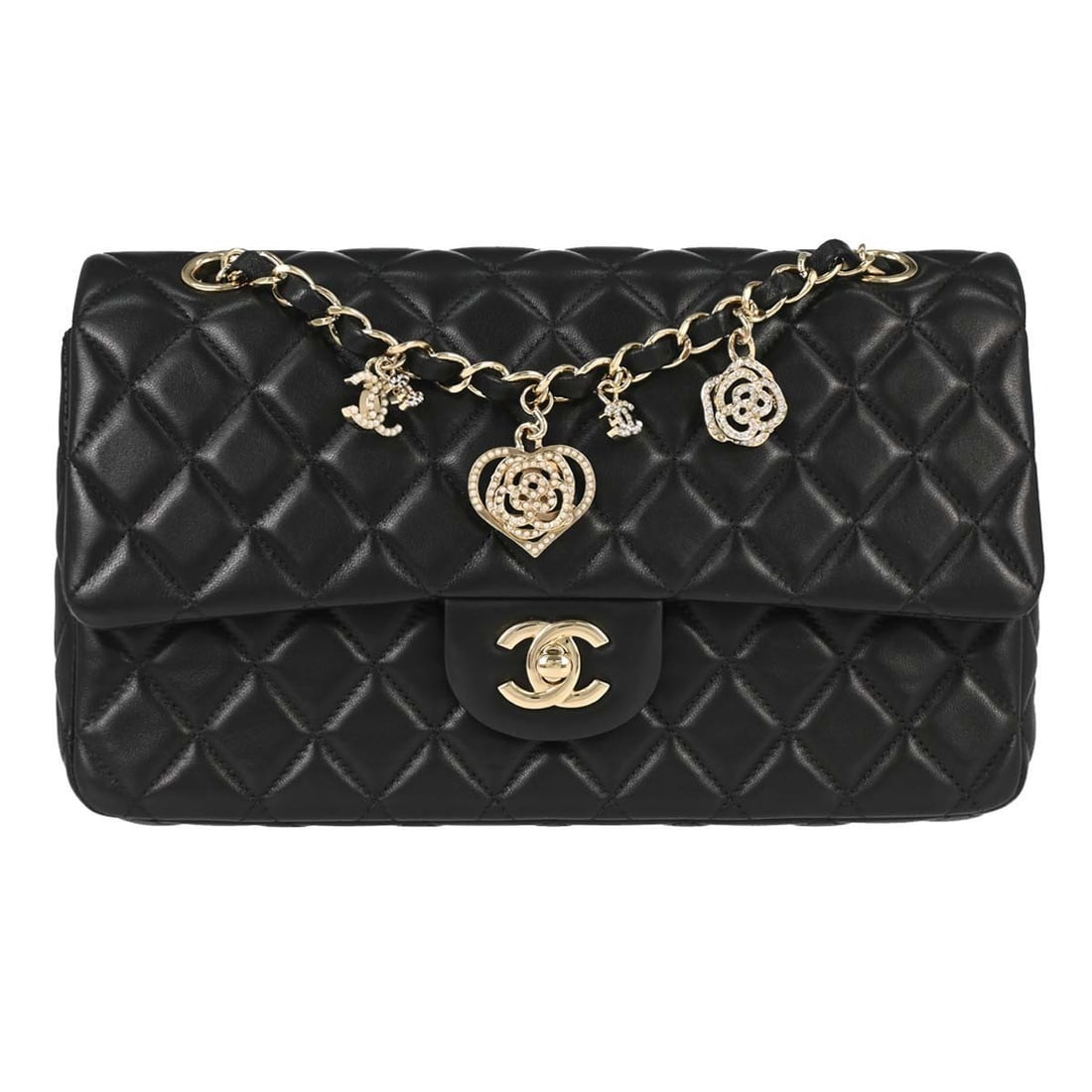 CHANEL Classic medium shoulder bag in black lambskin: CHANEL Classic medium shoulder bag in black lambskin Chanel single flap shoulder bag in black lambskin with a matelasse pattern and turnlock closure. This medium shoulder bag features an adjustable ch