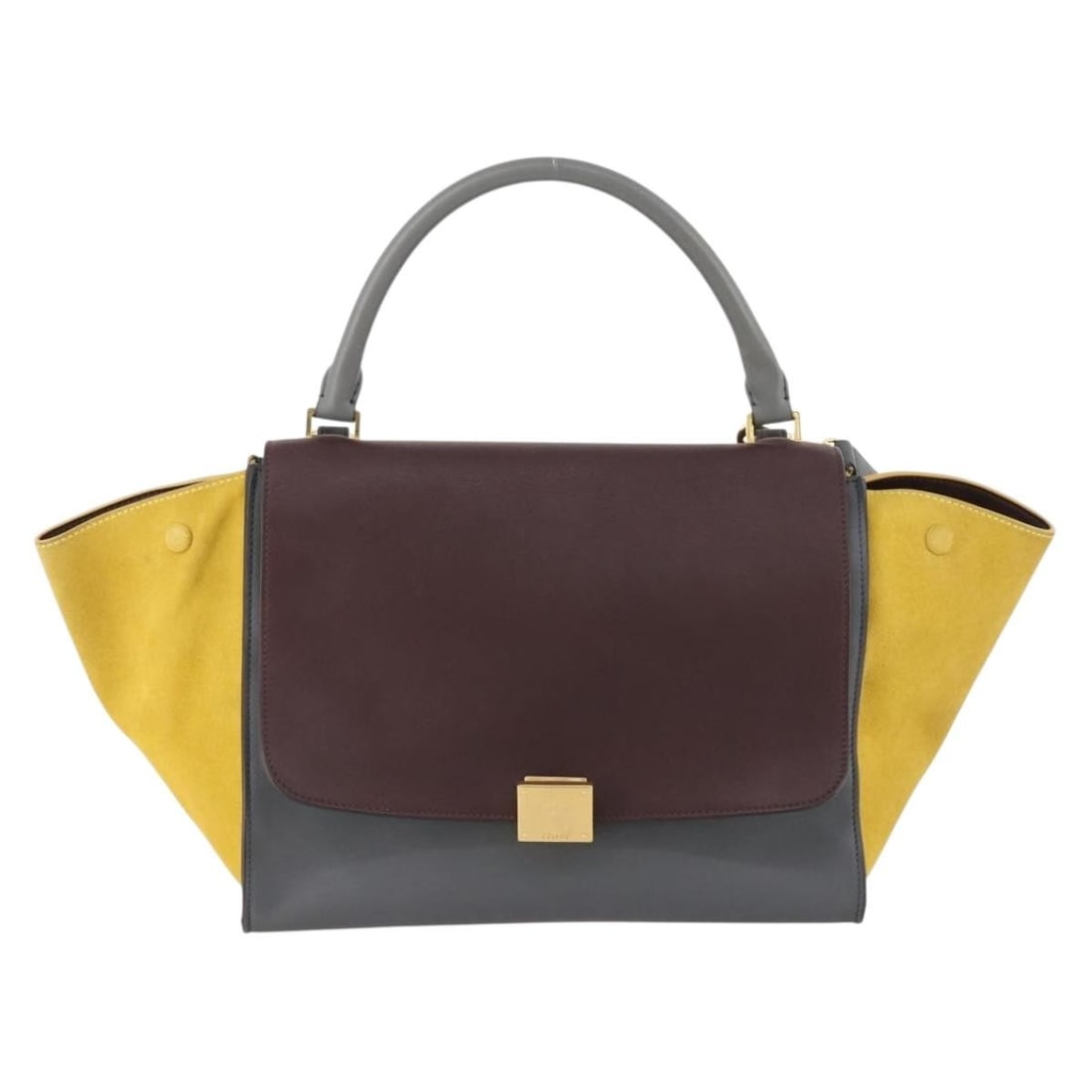 Leather Tricolor Trapeze Handbag by Celine Italy 30cm: Leather Tricolor Trapeze Handbag by Celine Italy 30cm The Celine Tricolor Trapeze Bag is crafted from multicolored leather and designed for women. This Italian-made handbag features a structured silho